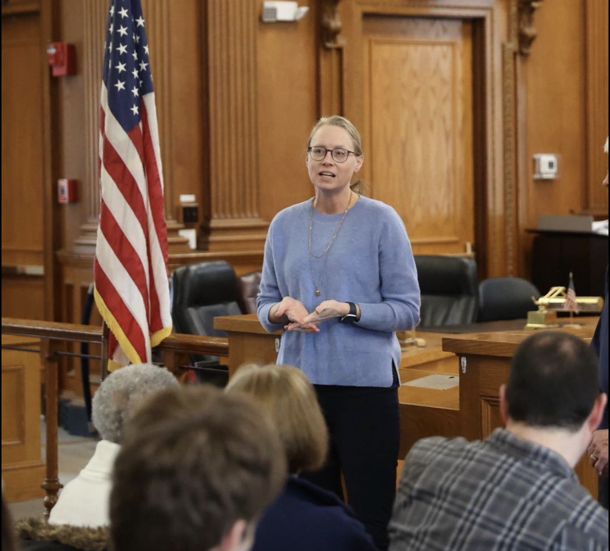 Christine Barber taking questions at a community forum